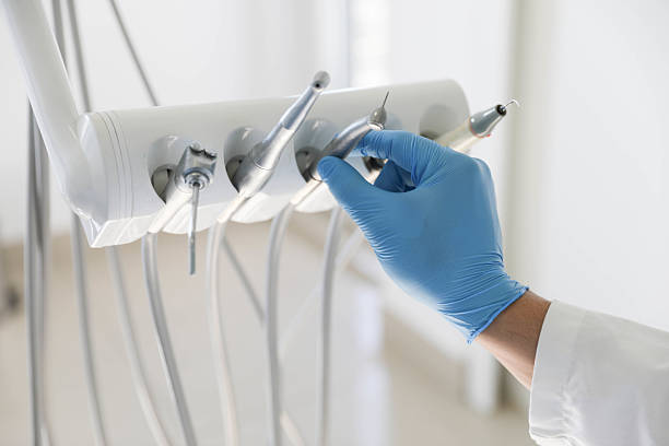 Professional Tooth Extraction technician working in Dania Beach, FL